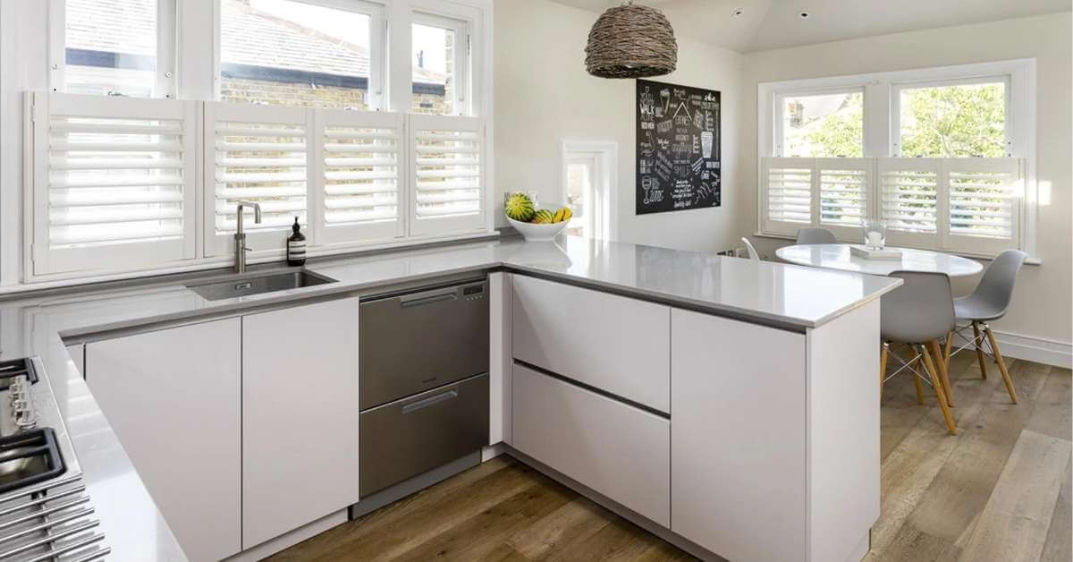 Shutters offer a blend of form and function that few other window treatments can match. In a kitchen, that’s essential.