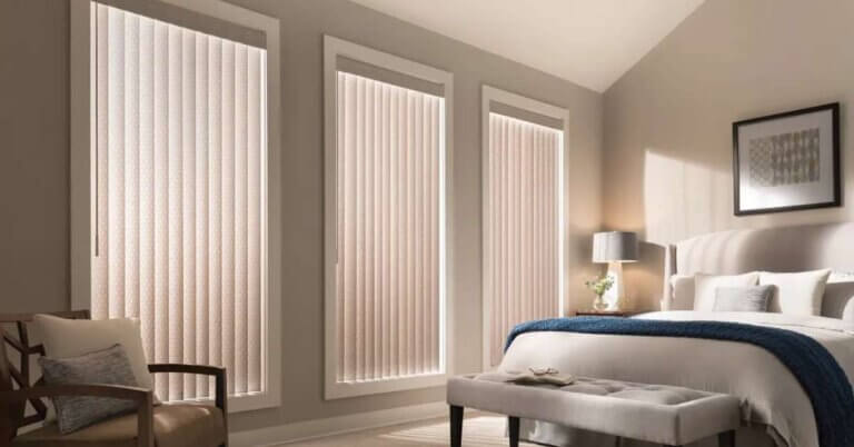 Peach-colored vertical blinds in a beige bedroom