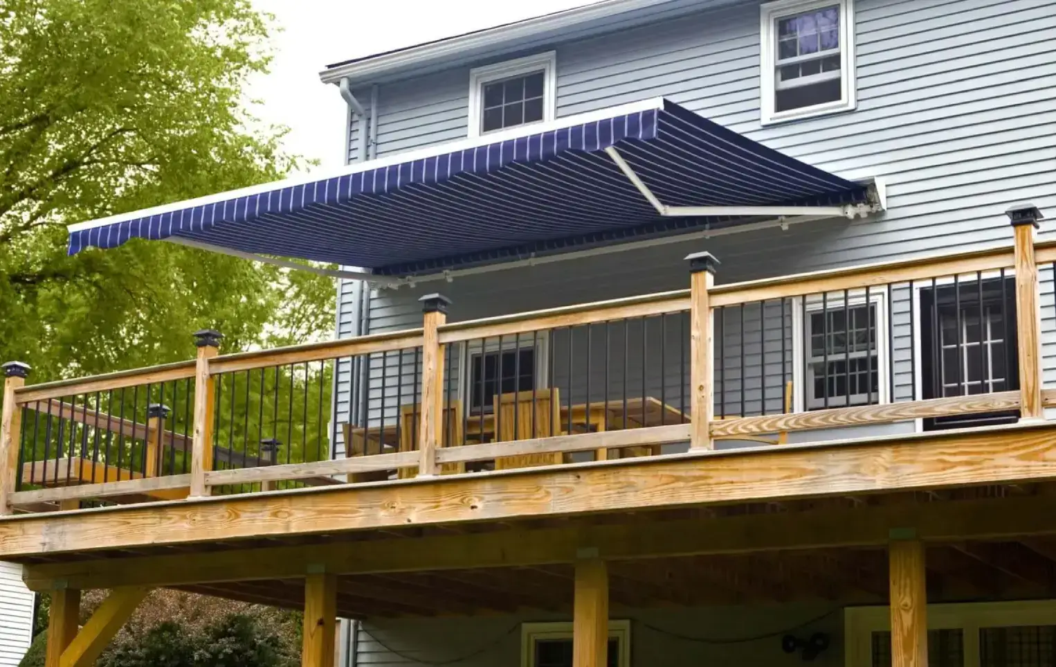 Blue retractable awnings in balcony