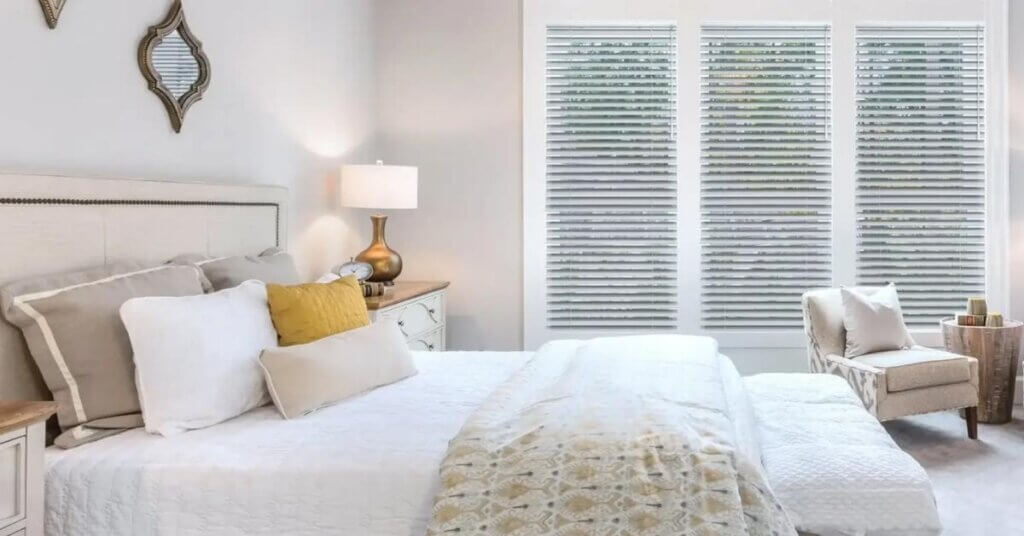 Wood blinds in a bedroom